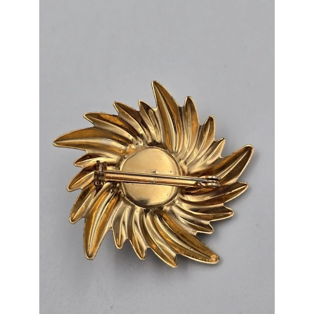 Vintage Gold Tone Swirl Sunburst Brooch Pin with Black Cabochon Center 1980s 90s